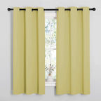 NICETOWN Paler Yellow Room Darkening Curtains for Kitchen, Window Treatment Thermal Insulated Solid Grommet Room Darkening Curtains/Drapes for Bedroom (Set of 2, 42 inches Wide by 48 inches Long)