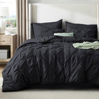 Bedsure California King Comforter Set Black - Bed in a Bag Cal King Bedding Set 7 Pieces, GentleSoft™ Pintuck Bed Set Gift for Family, Pinch Pleat Black Comforter with Sheets, Pillowcases & Shams